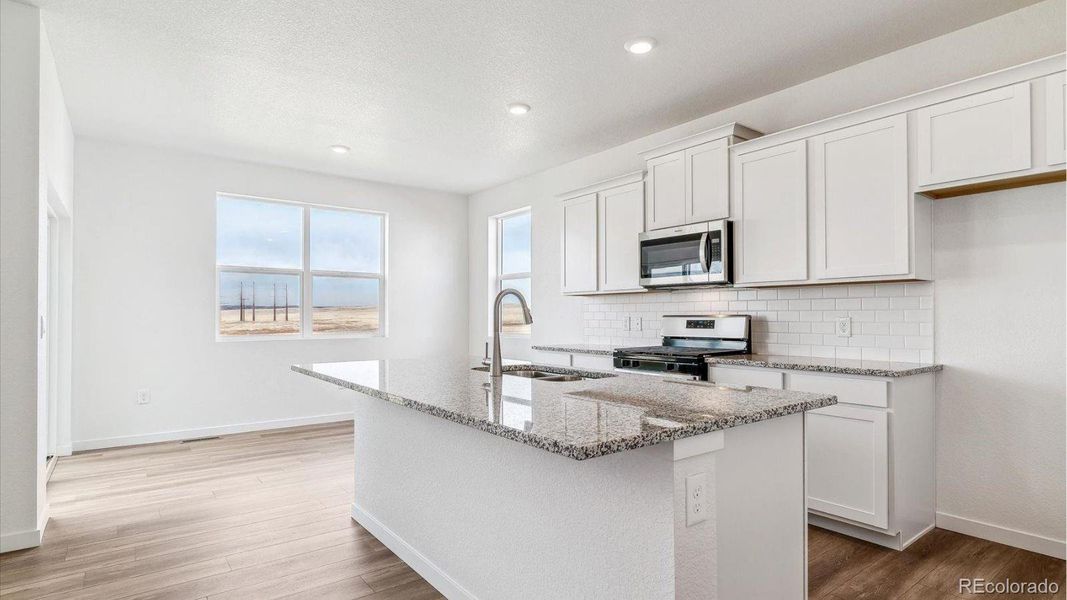 Furnished interior view inside a new home in The Ridge at Lorson Ranch, Colorado Springs (Image 6). Furnished interior view inside a new home in The Ridge at Lorson Ranch, Colorado Springs (Image 6).