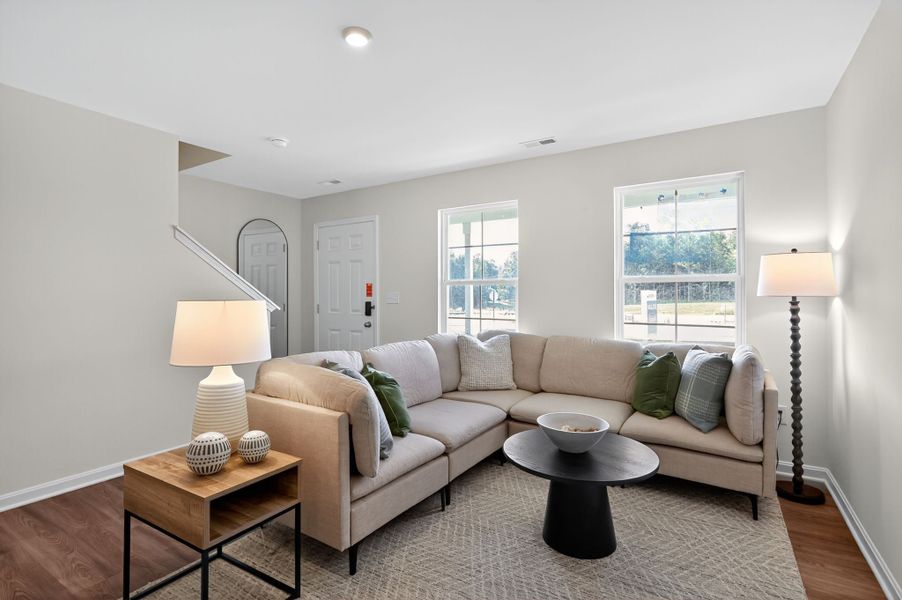 A living room with a couch and a coffee table.
