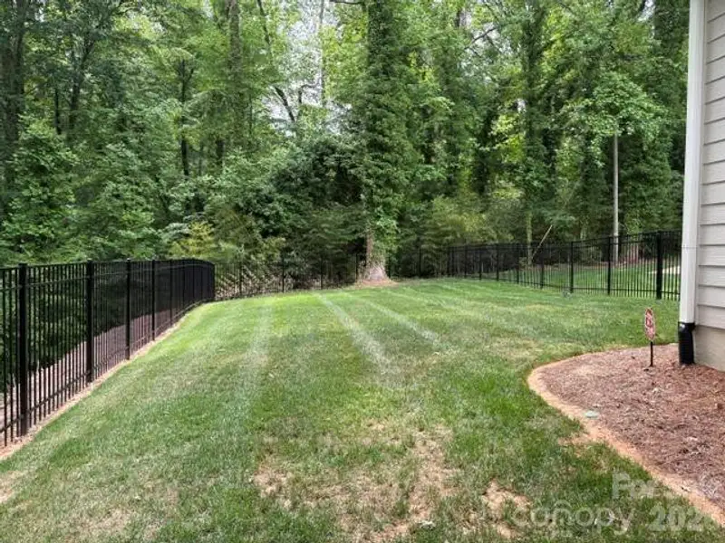 Exterior details and patio area of a home in , Mooresville (Image 3).
