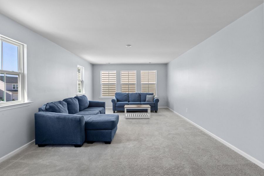 Furnished interior view inside a new home in Sweetgrass at Summers Corner, Summerville (Image 32).