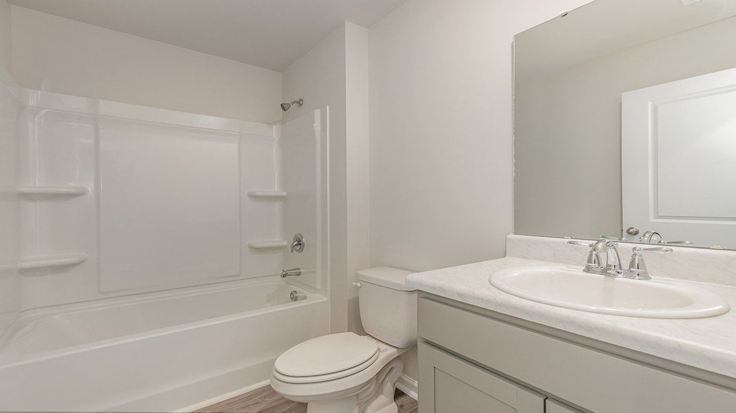 Representative furnished interior of a home built from the DOVER-EXPRESS by D.R. Horton in Stanbury Creek, Supply (Image 6).