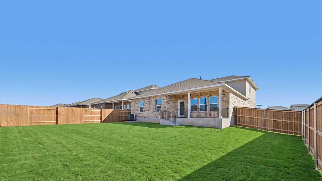 Exterior details and patio area of a home in Bar W Ranch, Leander (Image 2).