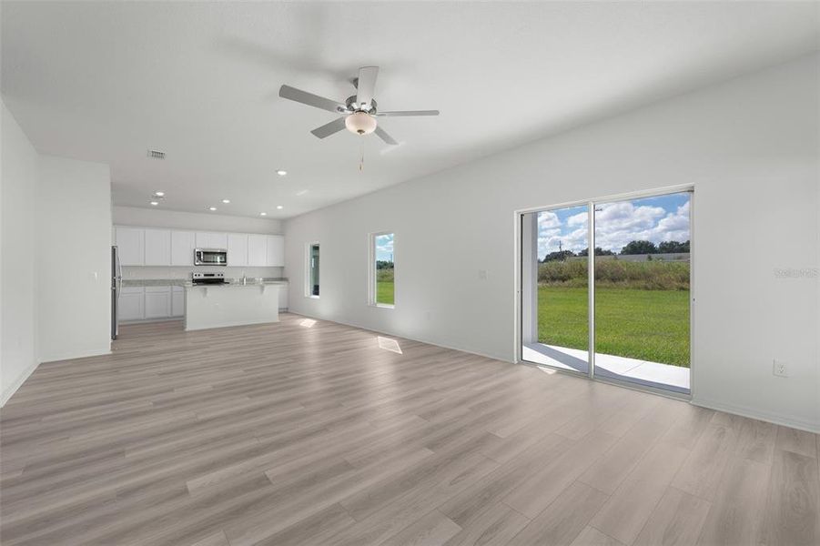 Spacious, unfurnished interior of a new home in Peach Crossings, Winter Haven (Image 27).