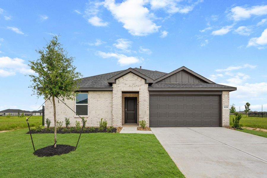 Front exterior of a new home in Sunterra, Katy, TX, highlighting curb appeal (Image 1). Front exterior of a new home in Sunterra, Katy, TX, highlighting curb appeal (Image 1).