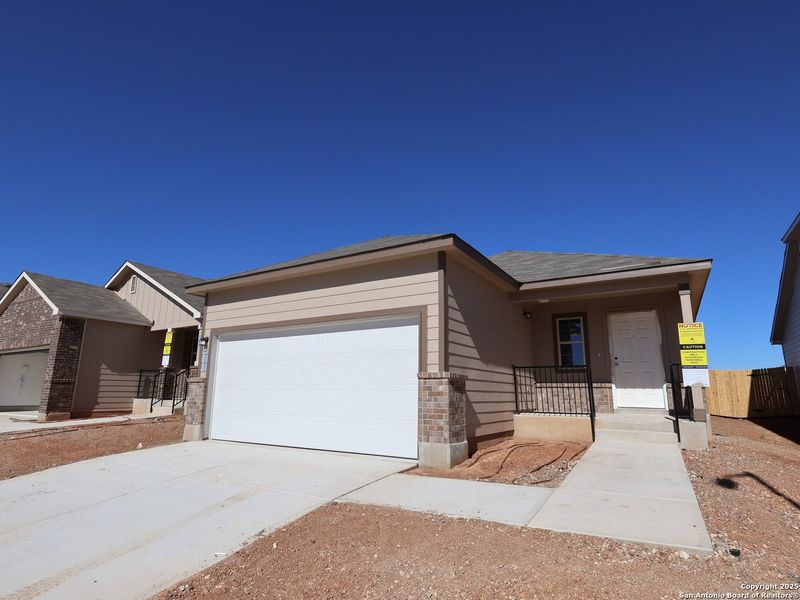 Exterior details and patio area of a home in Park Place, New Braunfels (Image 20).