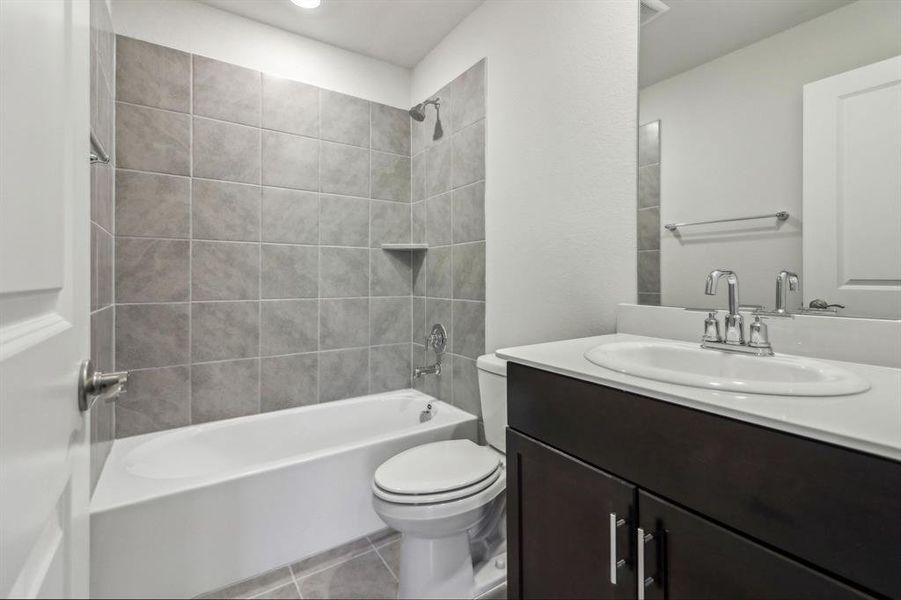 Photo is not of the actual home, but is an inspirational photo of builder’s model home and may depict options, furnishings, and/or decorator features that are not included.