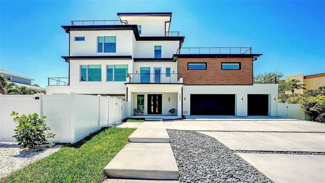 Front exterior of a new home in , Sarasota, FL, highlighting curb appeal (Image 1).