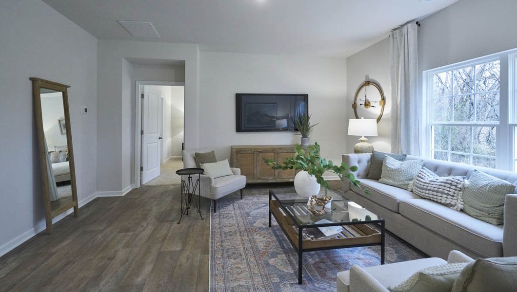 Representative furnished interior of a home built from the CALI by D.R. Horton in Raven Ridge, Lexington (Image 16).
