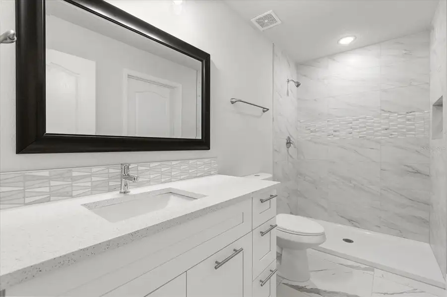 Furnished interior view inside a new home in , Kissimmee (Image 9).