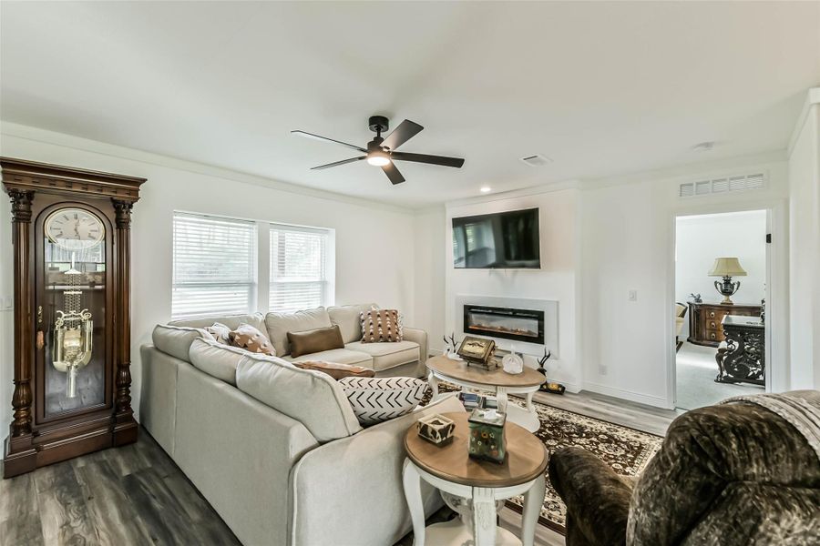 Living area w/ Ambient lit, electric fireplace