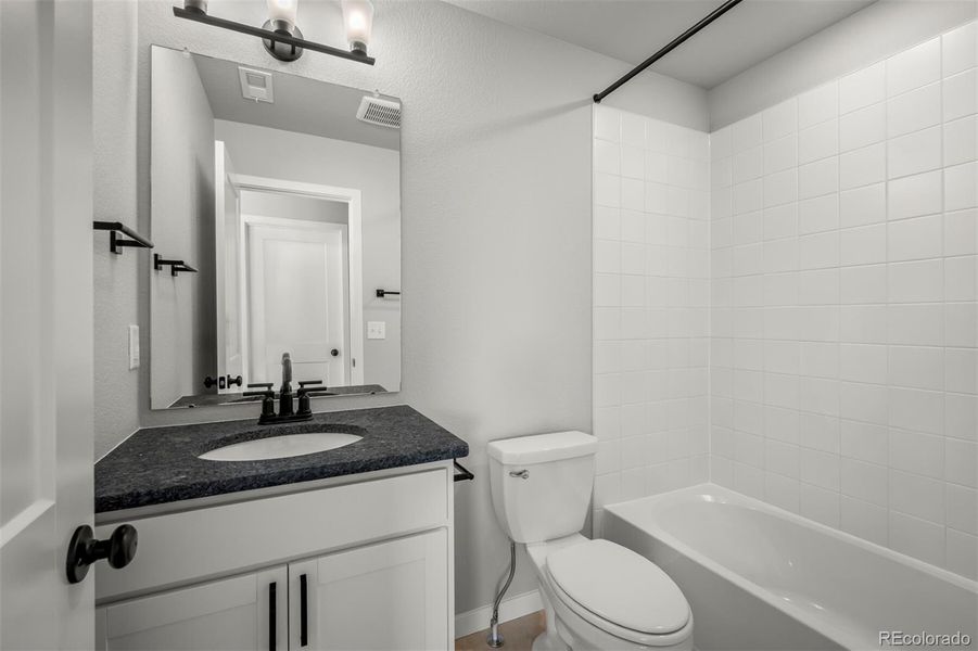 Furnished interior view inside a new home in Revel Crossing at Wolf Ranch – The Ascent Collection, Colorado Springs (Image 11).