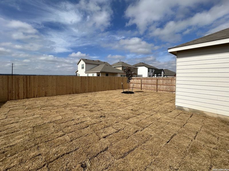 Exterior details and patio area of a home in Hennersby Hollow, San Antonio (Image 23).