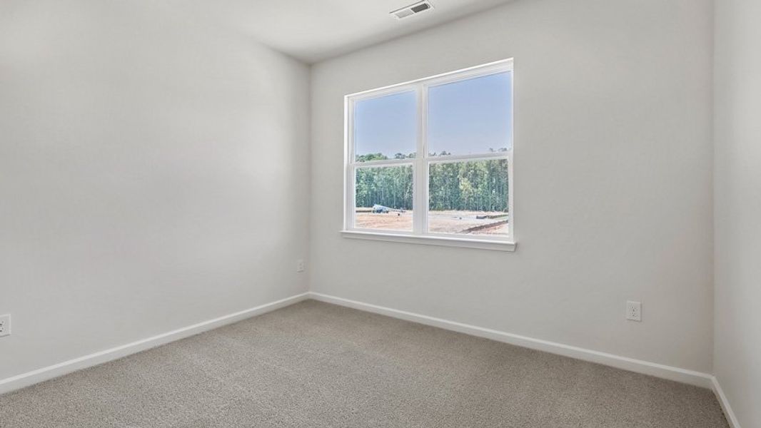 Representative unfurnished interior of a home built from the DANIEL by D.R. Horton in The Townes Park, Apex (Image 25). Representative unfurnished interior of a home built from the DANIEL by D.R. Horton in The Townes Park, Apex (Image 25).