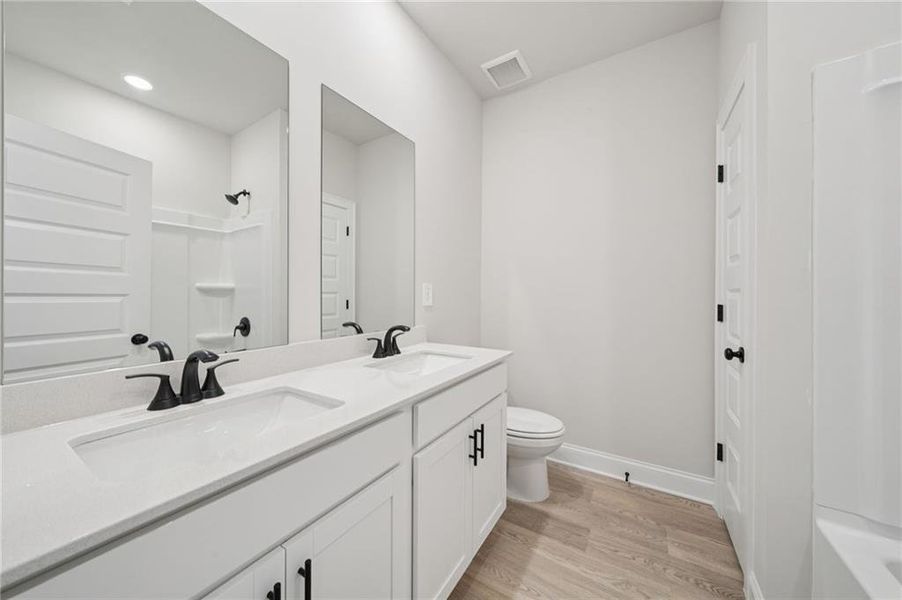 Furnished interior view inside a new home in Martin Springs - Estate Series, Lawrenceville (Image 10). Furnished interior view inside a new home in Martin Springs - Estate Series, Lawrenceville (Image 10).