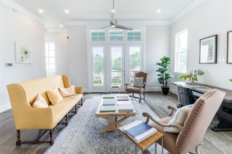 Beautiful trio of glass with transom windows above…..all leading to a large balcony.