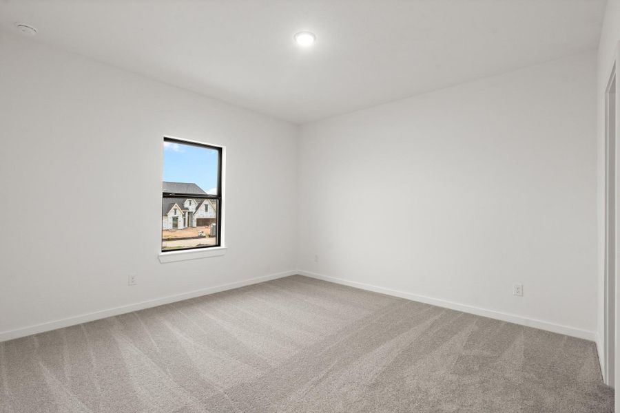 Spacious, unfurnished interior of a new home in Legacy Prairie at Katy Court 60', Katy (Image 9).