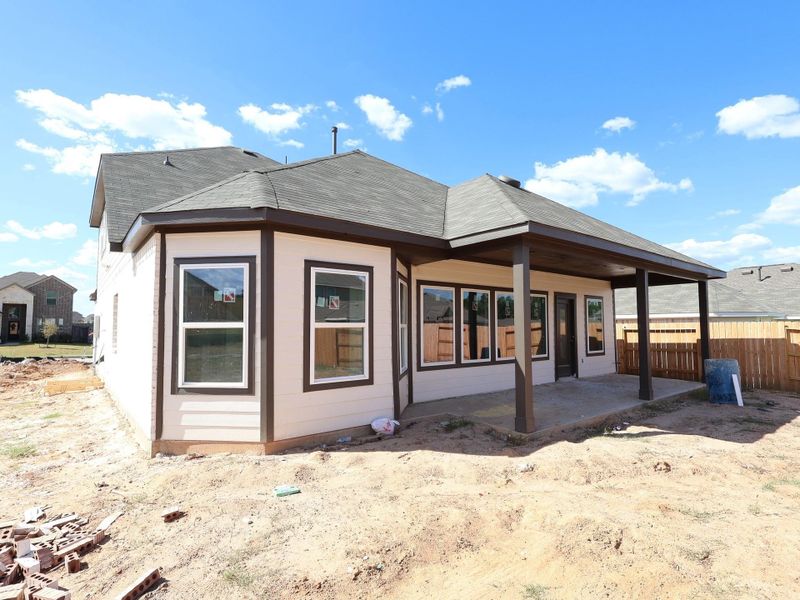 Exterior details and patio area of a home in Magnolia Ridge, Magnolia (Image 7). Exterior details and patio area of a home in Magnolia Ridge, Magnolia (Image 7).