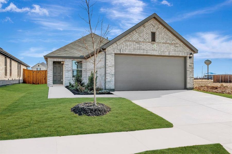 Front exterior of a new home in Meadow Park, Denton, TX, highlighting curb appeal (Image 22). Front exterior of a new home in Meadow Park, Denton, TX, highlighting curb appeal (Image 22).