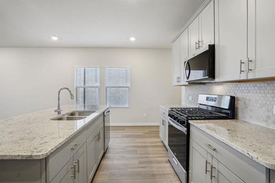 Photo is not of the actual home, but is an inspirational photo of builder’s model home and may depict options, furnishings, and/or decorator features that are not included.