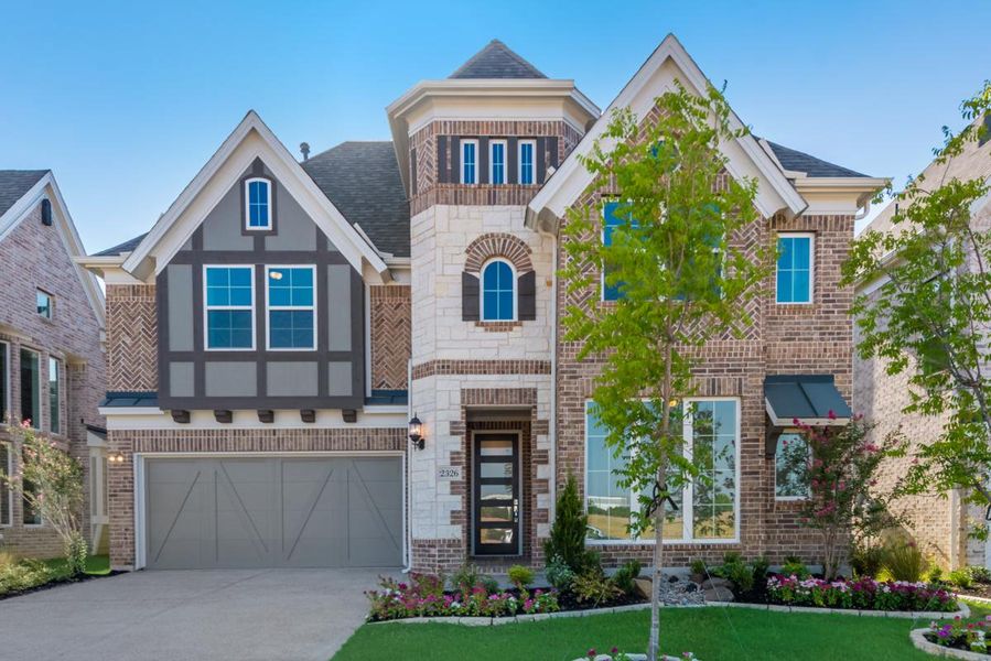 Representative exterior photo of a completed home built from the Grand Tour by Grand Homes in Providence Cove, McKinney, TX (Image 16).