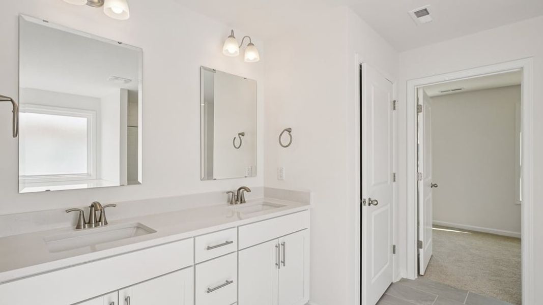 Furnished interior view inside a new home in Eagle Creek, Fuquay Varina (Image 9). Furnished interior view inside a new home in Eagle Creek, Fuquay Varina (Image 9).