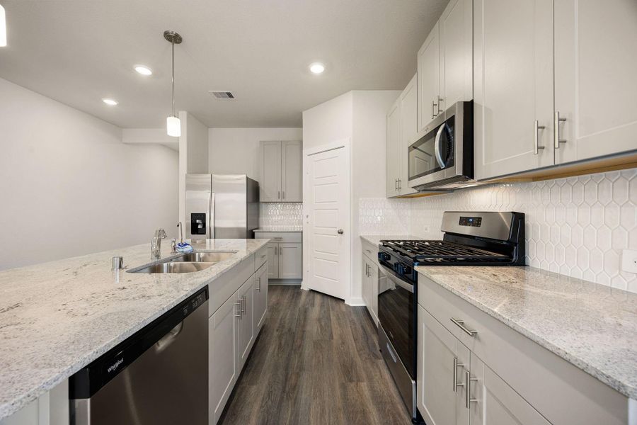 This kitchen is perfect for everyday life as well as entertaining family and friends! Extra large kitchen island is perfect for conversation or that much needed space to lay out your party spread for everyone to enjoy! This kitchen is perfect for everyday life as well as entertaining family and friends! Extra large kitchen island is perfect for conversation or that much needed space to lay out your party spread for everyone to enjoy!