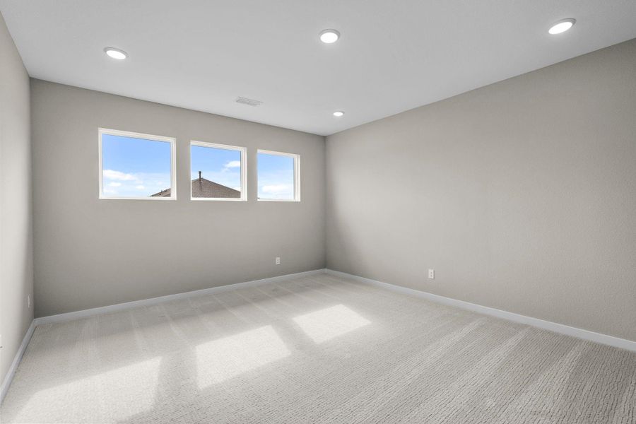 Generous game room provides extra living and entertainment space for your bustling family