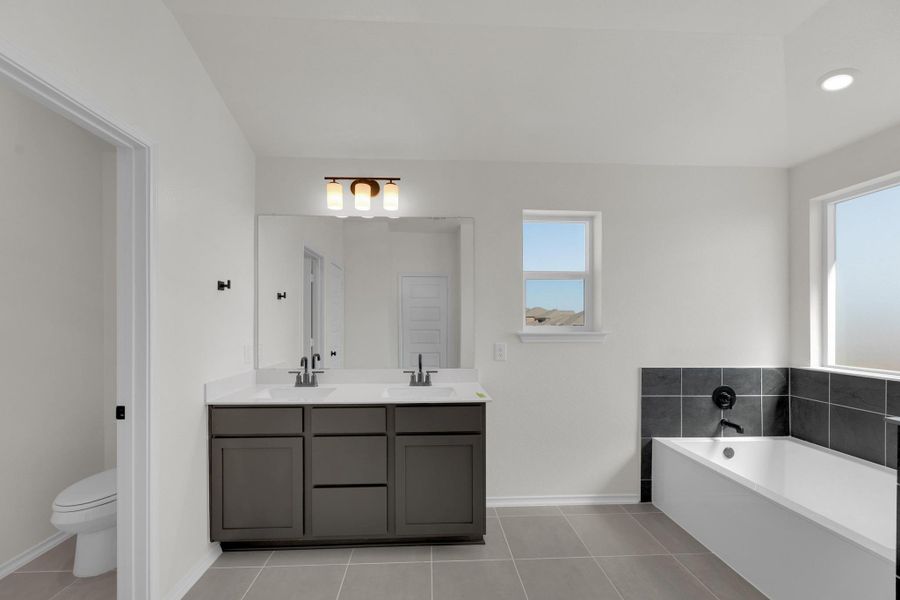 Furnished interior view inside a new home in Salerno - Classic Collection, Round Rock (Image 12). Furnished interior view inside a new home in Salerno - Classic Collection, Round Rock (Image 12).