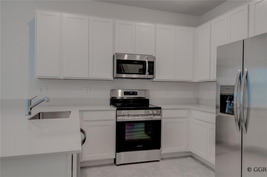Furnished interior view inside a new home in , Davenport (Image 8).