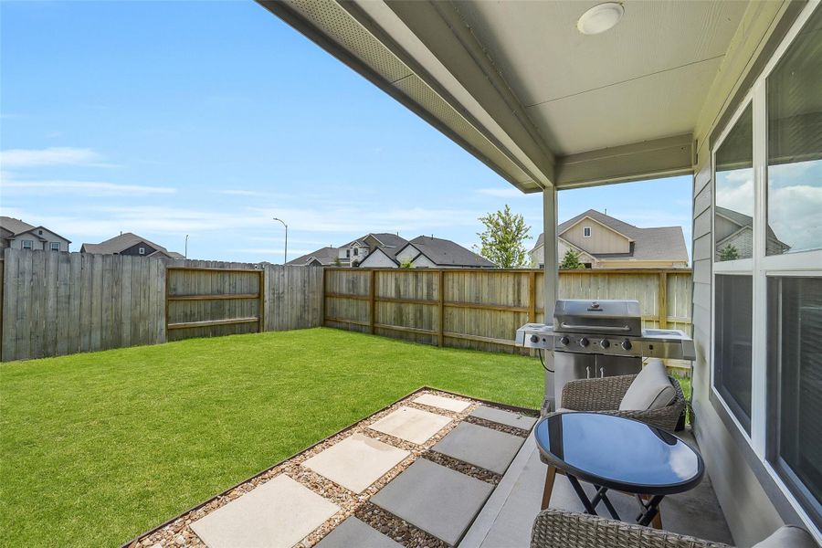 Exterior details and patio area of a home in Sunterra, Katy (Image 24). Exterior details and patio area of a home in Sunterra, Katy (Image 24).