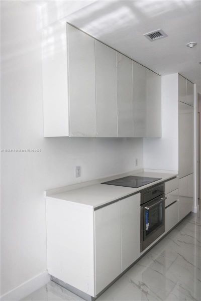 Furnished interior view inside a new home in Aria Reserve, Miami (Image 7). Furnished interior view inside a new home in Aria Reserve, Miami (Image 7).