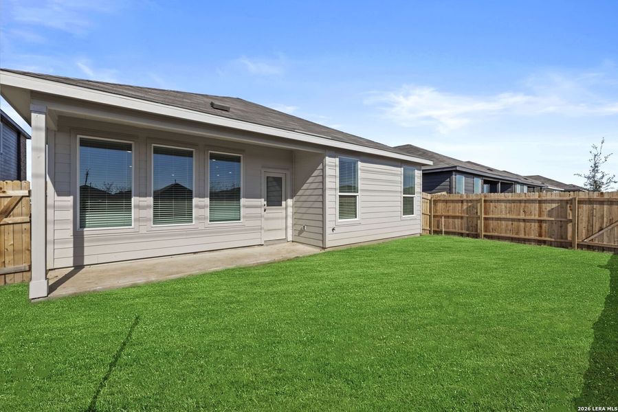 Exterior details and patio area of a home in Voss Farms, New Braunfels (Image 3).