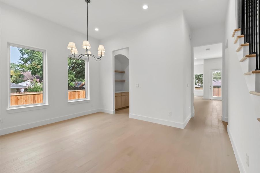 Elegant dining room with beautiful chandelier. Elegant dining room with beautiful chandelier.
