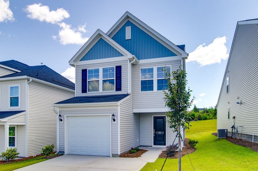 Front exterior of a new home in Ellington, Elgin, SC, highlighting curb appeal (Image 21).
