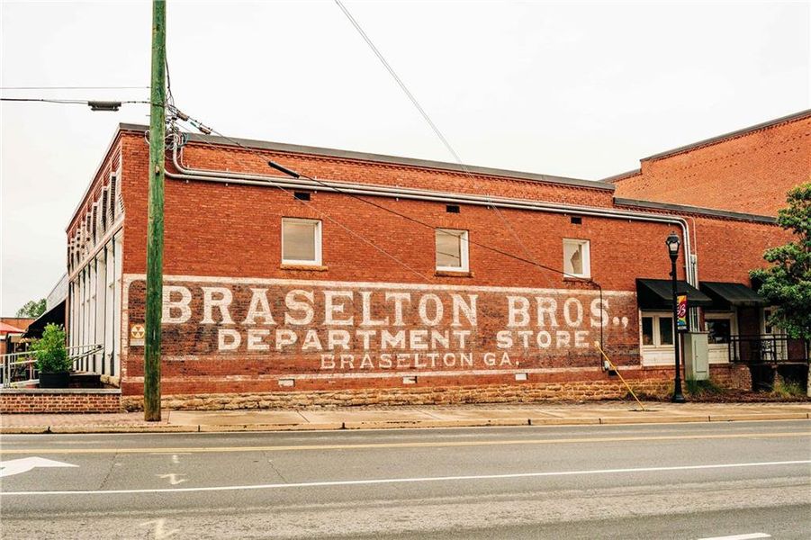Front exterior of a new home in Rosewood Lake Estates, Hoschton, GA, highlighting curb appeal (Image 77).