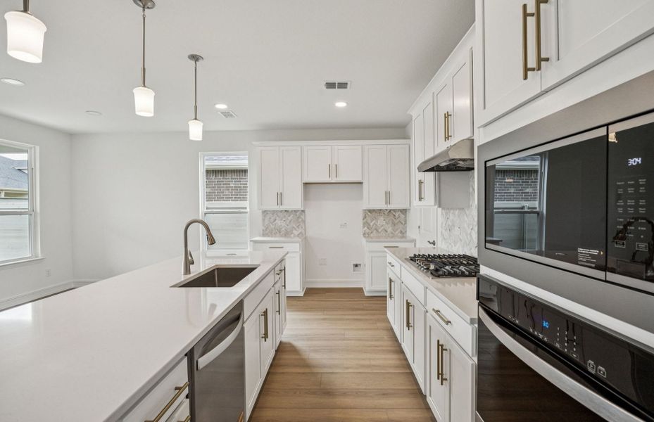 Gourmet kitchen designed for culinary excellence and entertaining  *Real home pictured