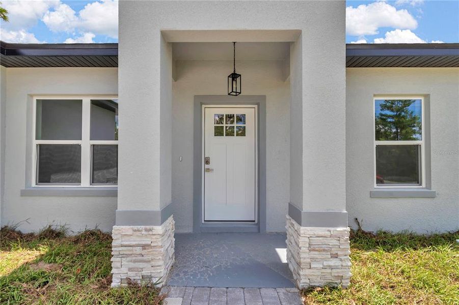 Exterior details and patio area of a home in , Citrus Springs (Image 23).