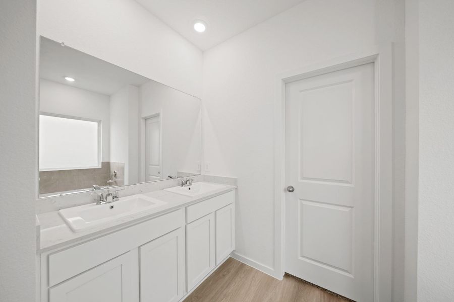 Furnished interior view inside a new home in Sunterra Lakes, Katy (Image 8).