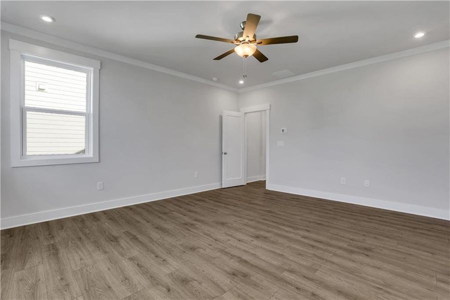 Spacious, unfurnished interior of a new home in The Paddocks at Doc Hughes, Buford (Image 33).