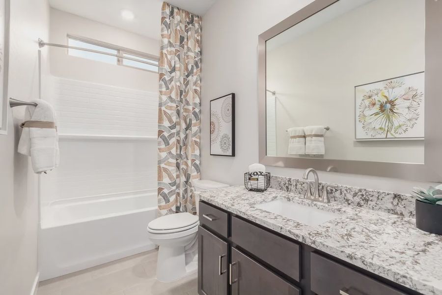 Furnished interior view inside a new home in Avanti at Granite Vista, Waddell (Image 15).