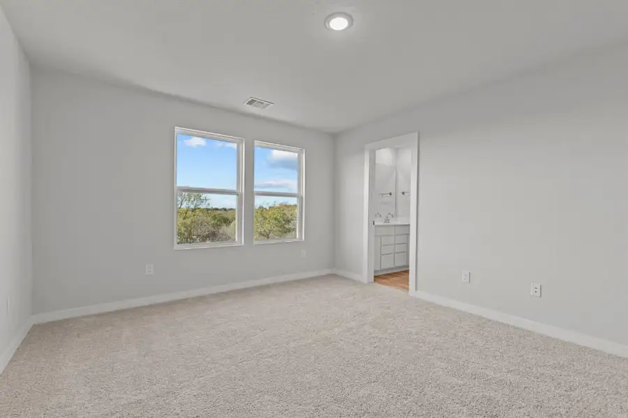 A room with a window and a door. A room with a window and a door.
