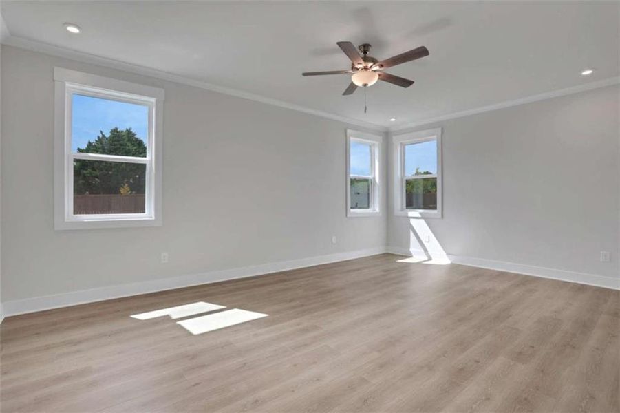 Spacious, unfurnished interior of a new home in The Paddocks at Doc Hughes, Buford (Image 19).