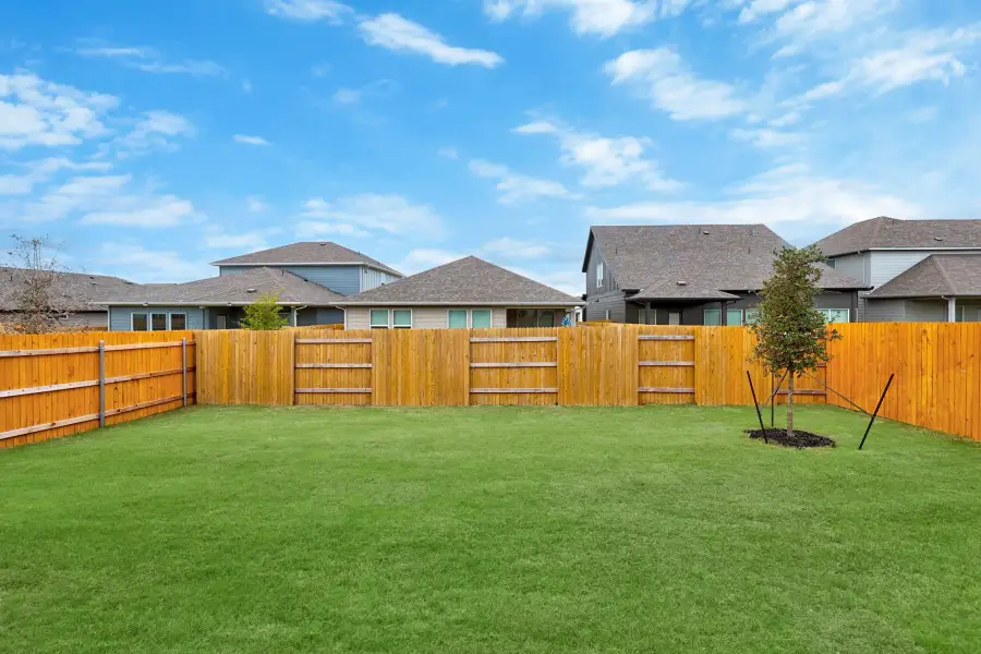 Exterior details and patio area of a home in Prairie Winds, Hutto (Image 18).