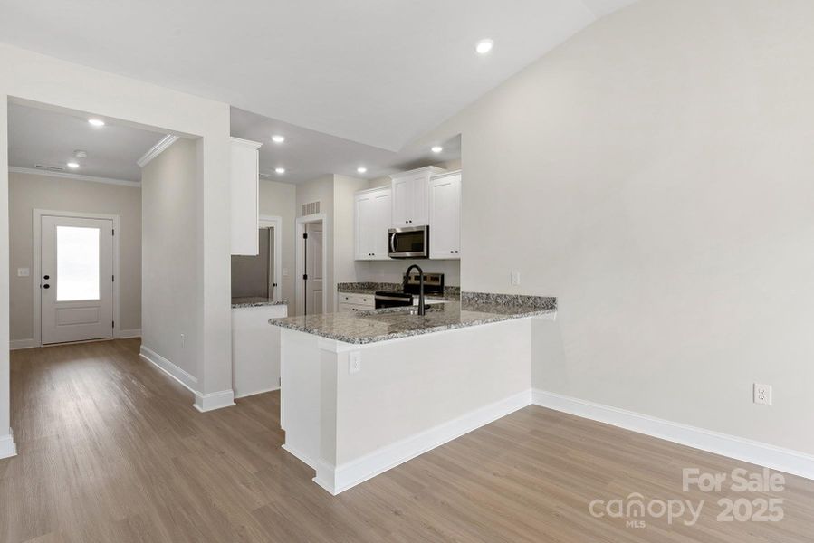 Furnished interior view inside a new home in Ascot Woods, Charlotte (Image 3).
