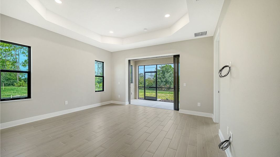 Spacious, unfurnished interior of a new home in Vicenza Real Estate and Homes for Sale in North Venice, FL - Neal Communities, Venice (Image 15).