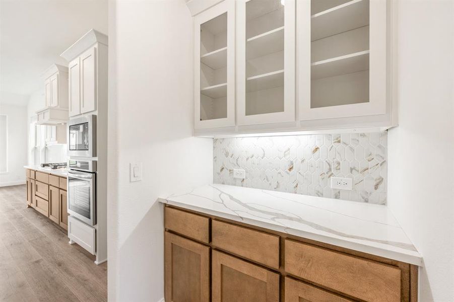 Furnished interior view inside a new home in Union Park Classic 60, Little Elm (Image 9). Furnished interior view inside a new home in Union Park Classic 60, Little Elm (Image 9).