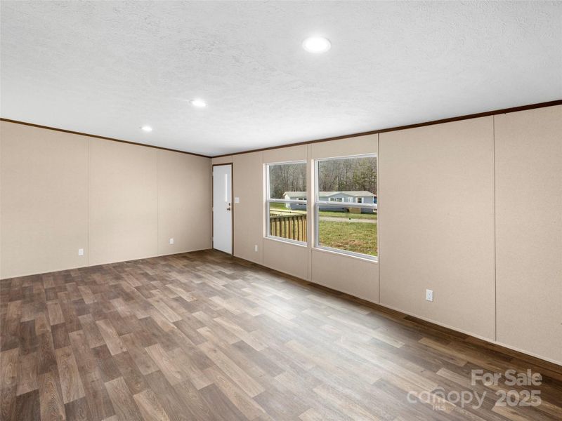 Spacious, unfurnished interior of a new home in , Old Fort (Image 11).