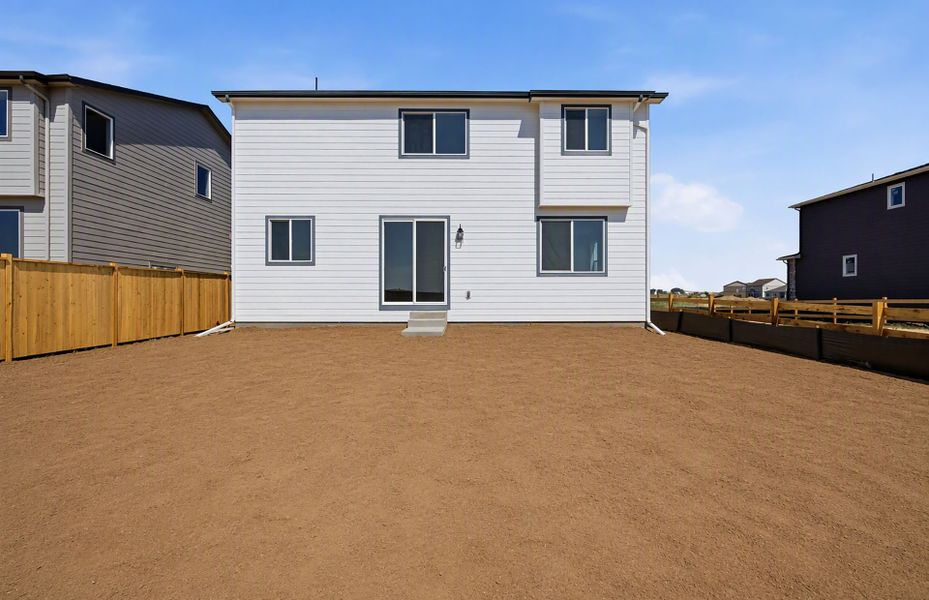Exterior details and patio area of a home in Murata Farms, Fort Lupton (Image 3).