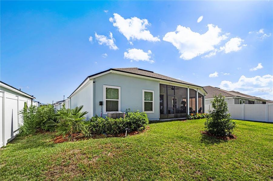 Exterior details and patio area of a home in Sawmill Branch, Palm Coast (Image 3).
