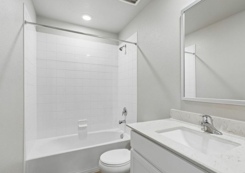 The secondary bathroom has a tub/shower combo.